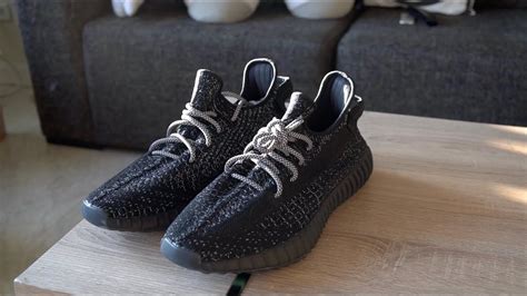 black reflective yeezy|yeezy black static restock.